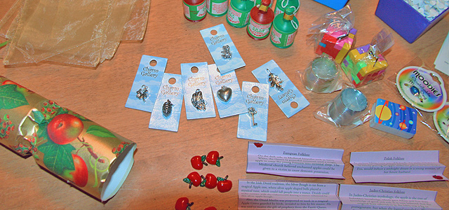 Autumn Equinox Party Cracker Contents Autumn Equinox Fall Cracker with Apple-Themed Paper and Ribbons Holiday & Hearth Holiday and Hearth Lisa Novelline Lisa Anne Novelline author writer The Dance of Spring craft blog creative blog creativity decorator blog festival celebration summer seasons nature blog Mabon Autumn Equinox Harvest Season Season of the Witch September