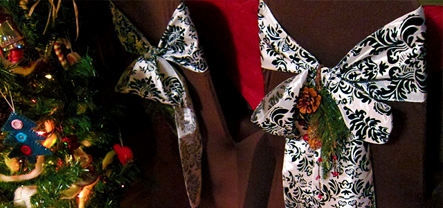 Yule Chair Covers and Chair Sashes Holiday & Hearth Holiday and Hearth Lisa Novelline Lisa Anne Novelline author writer The Dance of Spring craft blog creative blog creativity decorator blog festival celebration seasons nature blog Winter Christmas Yule yuletide Winter Solstice December yule handcrafted homemade Yuletide Dining Table Décor napkins placemats table linens favors tablecloth dishware glassware centerpiece chair covers chair sashes personalized wine charms place cards hurdy gurdies