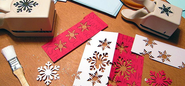 Punched Out Snowflake Impressions Holiday & Hearth Holiday and Hearth Lisa Novelline Lisa Anne Novelline author writer The Dance of Spring craft blog creative blog creativity decorator blog festival celebration seasons nature blog Winter Christmas Yule yuletide Winter Solstice December craft punch snowflakes garland glitter homemade handcrafted